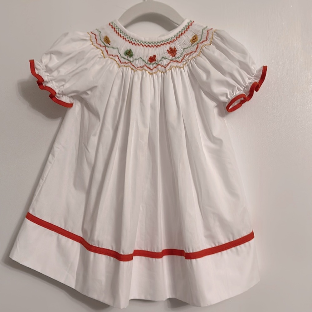 12 month Fall / Halloween Dress - Best Dressed Child brand. White orange smocked